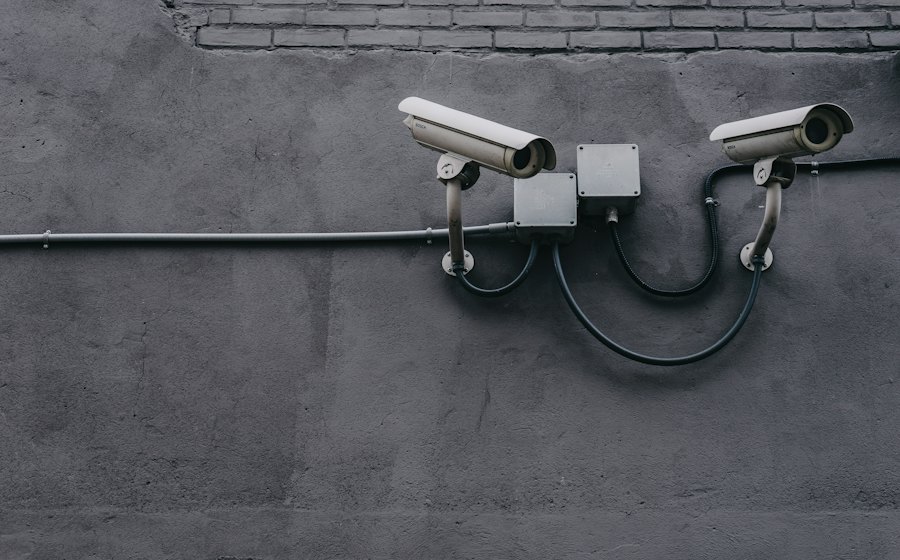 Two CCTV cameras mounted on a wall